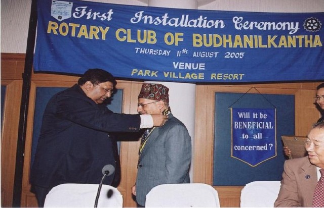 First Installation Ceremony - DG Rtn. Swapan Mukharjee presenting collar to President Rtn. Dr. Badri Raj Pande