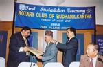 First Installation Ceremony - DG presenting the Club Charter  to the President