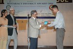 DG Nominee Rtn. Dr Tika Man Vaidya felicitating the host club of District Events