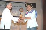 District Secretary Rtn. Siba Bhakta Rajbhandari presenting Best President Award 2006 to Rtr. Rajan Piya