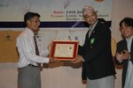 On behalf of Rotaract District Council Family, DS Rtr. Anil Shrestha presenting Certificate of Excellency to ADRR Rtr. Avash