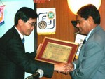 Receiving Vocational Award  from Ambassador of Republic of Korea H.E.Sang Hoon Park , President of Carpet Exporters' Association Mr. Kabindra Nath Thakur During the 5th Installation of RC Dillibazar 