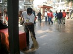  A Scene of Cleaning Campaign at Maitedevi Temple Jointly organized by Rotary and Rotaract Club of Dillibazar on 24th of December 2005 