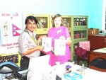 Exchanging Clubs Flag Rtn Surendra Dhakal and Rtn Margaret of RC Blackwood Australia After Signing Sister Club Agreement Between Two Clubs  