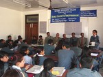 A Scene of Concluding Session of 2nd Batch of New Business Creation Training for Youth Organized Jointly by RC Dillibazar and National Integrated College in a period from 11th to 20th November 2005. AG Krishna Murari Timilsina Gave Away Certificate to the Trainees 