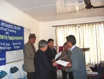 DS Shiva B Rajbhandari giving away certificate to the trainees of the Third Batch of New Business Creation Training for Youth Jointly organized by RC Dillibazar and National Integrated College. The Training was organized  in a period from 9 to 20  December 2005 