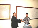 President of RC Dillibazar Rtn Surendra Dhakal Receiving Token of Love for his Contribution as Resource Person on Team Building Workshop Conducted Under Rotaract Leadership Development Training Organized by Rotaract Club of Patan on February 19, 2006  