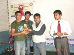 President Rtn Surendra Dhakal presenting Token of Love to a HIV Patient Mr. Surendra Simkhada who actively took part in the interaction program on HIV Aids organized jointly by Rotary and Rotaract Club of Dillibazar on Saturday 25th February with support from General Welfare Pratisthan.   