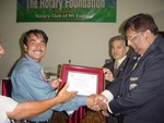 Club President Rtn Surendra Dhakal Receiving Letter of Appreciation from DG Swapan Mookherji for Big Presence of the Members of RC Dillibazar in TRF Seminar organized on August 10 2005 