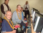 Donor Japanese visiting local school to hand over computers