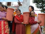 Villagers receiving Sand Filter