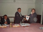 President Rtn. Sargat Vaidya presenting club flag to visiting Rotarian Rtn. Jean Grainger of RC Skiptan, UK Dist. 1040 