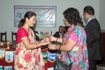 Bouquet presenting to Out going First Lady by In coming First Lady