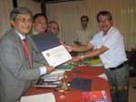 PHF pin and certificate hand over to Rtn. Gyanendra Bhari by DG Rabindra.