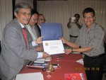 PHF pin and certificate hand over to Rtn. Chandra Krishna Shrestha by DG Rabindra.