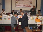 PHF pin to Rtn. Dr. Surendra Prasad Joshi by DG. Ratna Man Sakya