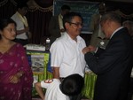 DG Rtn. Dilendra Raj Shrestha pining Rotary pin to newly inducted Gyanendra Bhari