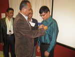 Rotary Pin to newly inducted member Mr. Chandra Krishna Shrestha by AG Rajendra Lal Shrestha.
