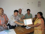 RCC certificate handover to RCC President