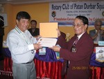 PHF certificate to President Mangal Man Bajrachary hand over by DG Tirtha Man 
Sakya