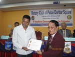 PHF certificate to Rtn Narayan Puri hand over by DG Tirtha Man Sakya