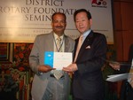 Rtn. Janak Prakash Thapa receiving PHF certificate from RI President in TRF seminar on 17th Nov 08