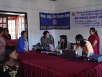 Patient consulting with doctor about her disease in Breast Cancer awareness program held on 25th Oct 2008