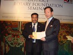 President Sargat Vaidya receiving MPHF certificate from RI President in TRF seminar on 17th Nov 08