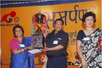 President Rtn. Sargat Vaidya on behalf of RC Patan Durbar Square receiving award of 1st position in Water Management. 